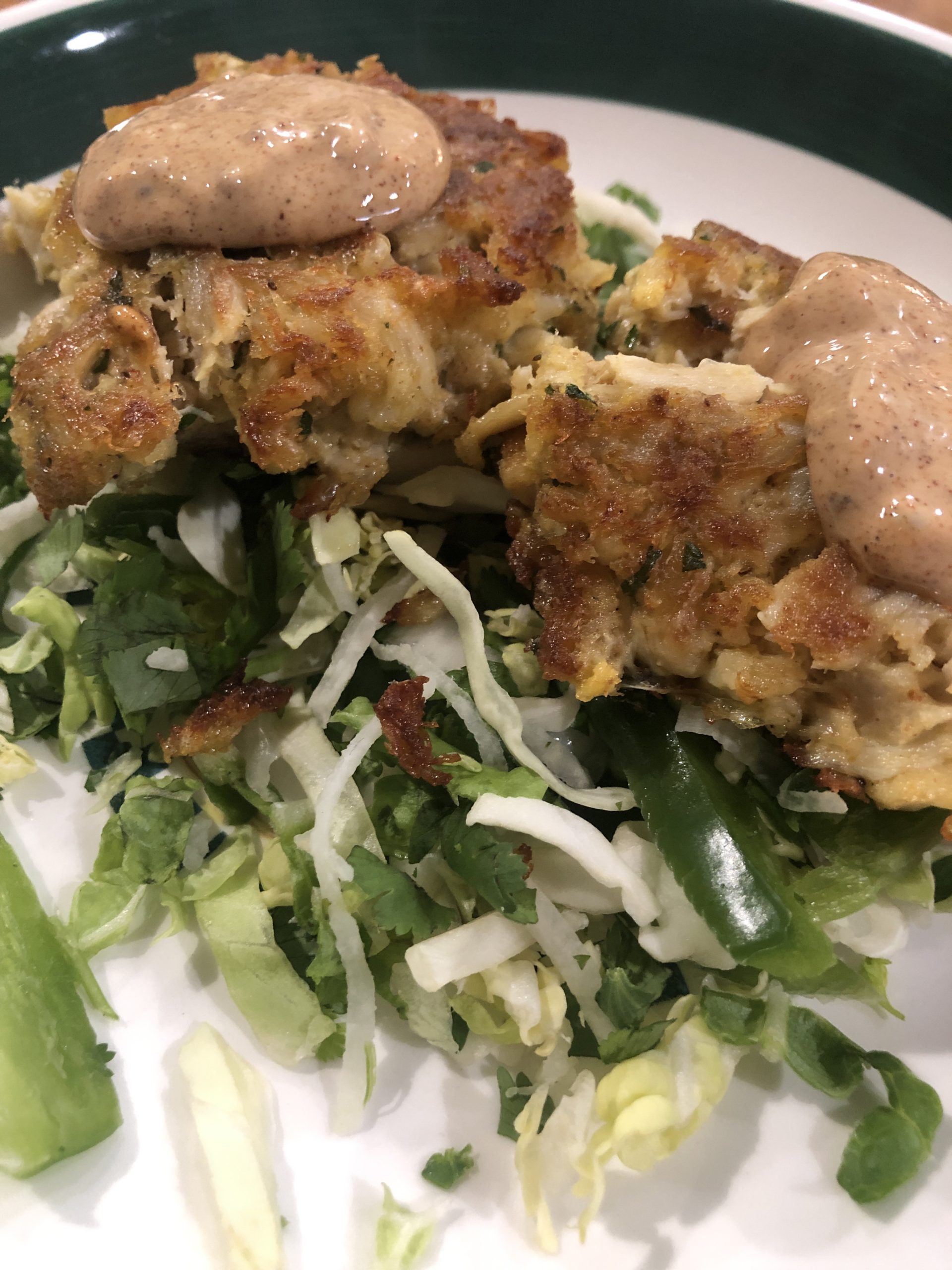 Crab cake with remoulade and slaw. Exquisite. Food and Drink